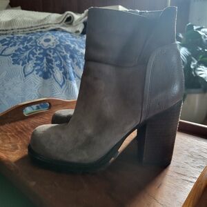 Gray suede heeled boot with lug sole